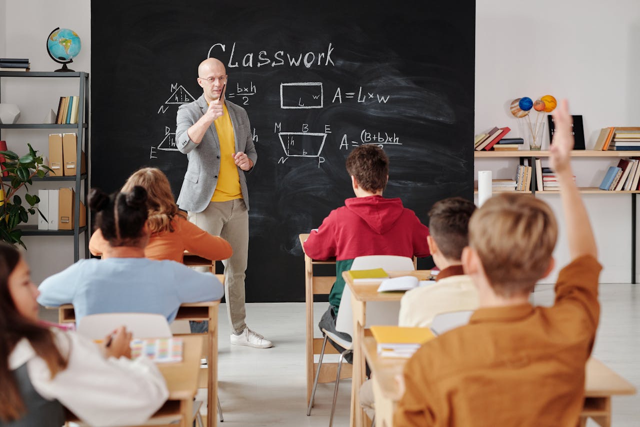 Teacher Asking a Question to the Class - Max Fischer via Pexels
